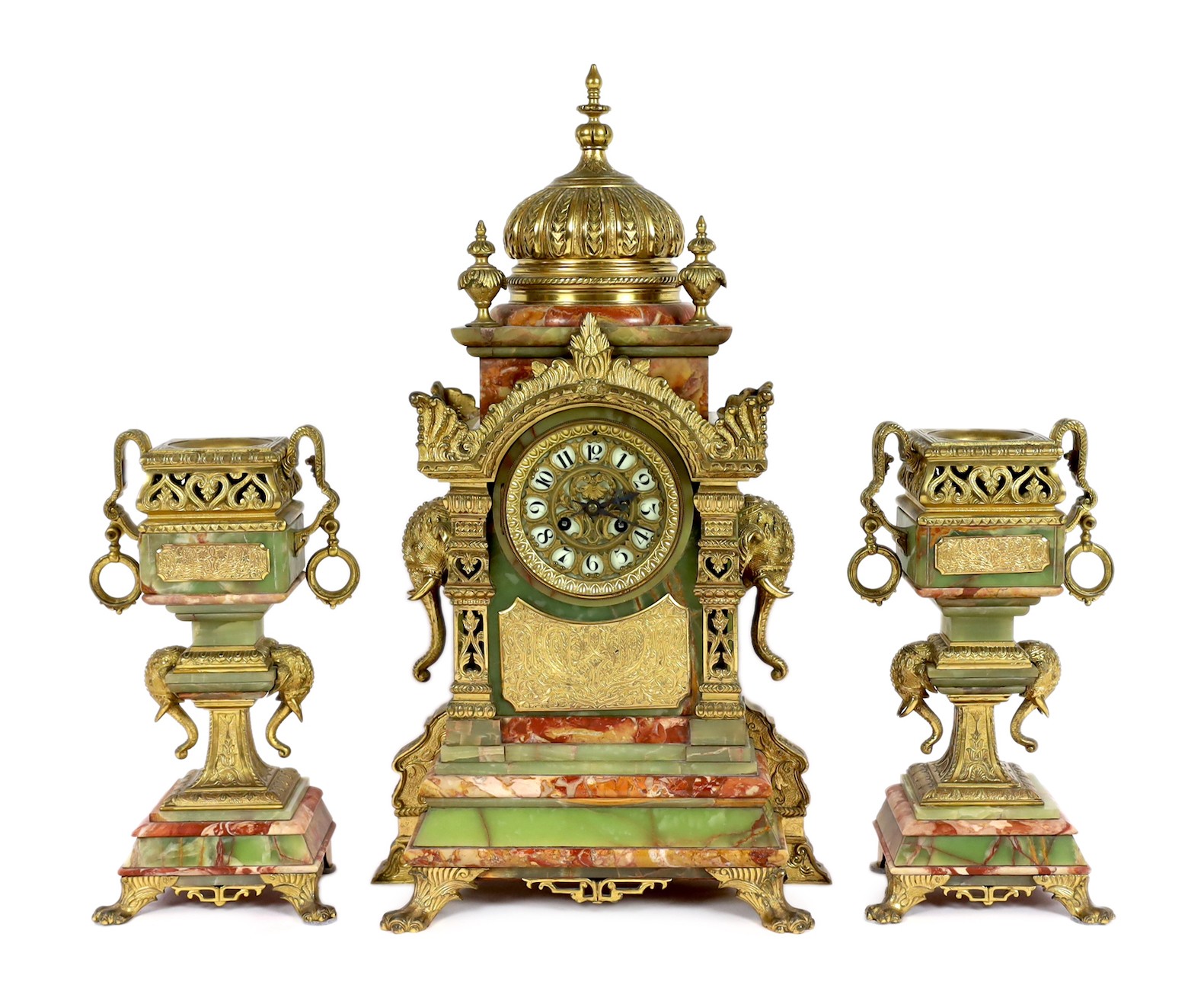 A late 19th century French ormolu mounted marble and green onyx clock garniture, of Indian inspiration, clock 34cm wide, 63cm high, side vases 36cm high